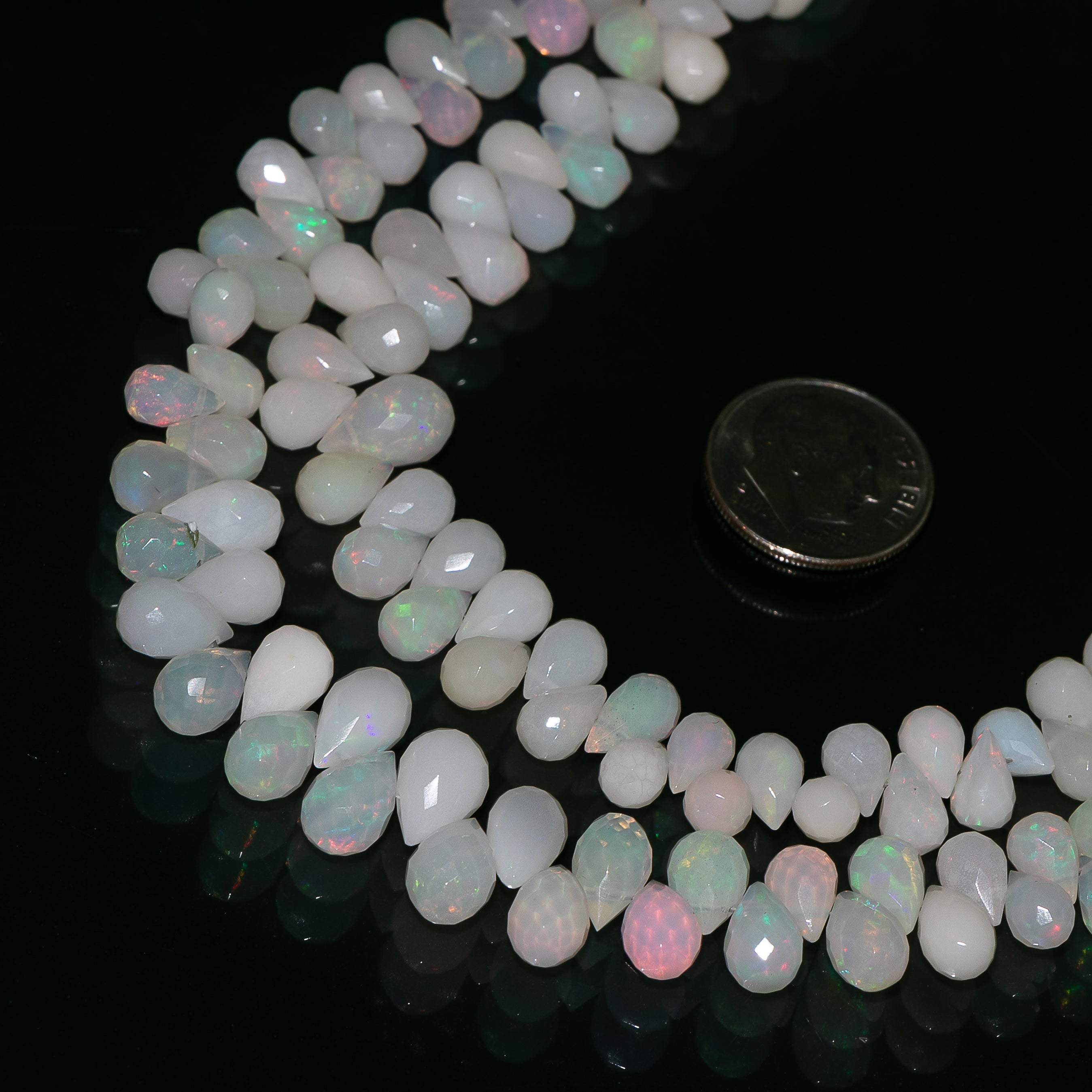 Size - 3.5x5.5-7x10mm Hole Size - .40mm Stone - Ethiopian Opal Shape - Drop Each Strand Length -40 Cm. Average Strand Weight - 89 Cts