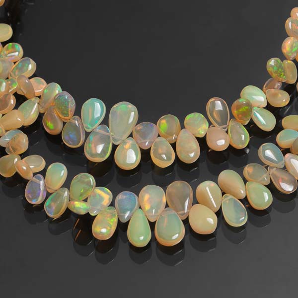 15"- 3x4.25-7x11mm Natural Ethiopian Opal Smooth Pear Gemstone Beads Strand