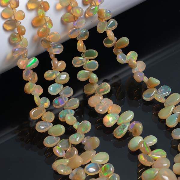 15"- 3x4.25-7x11mm Natural Ethiopian Opal Smooth Pear Gemstone Beads Strand